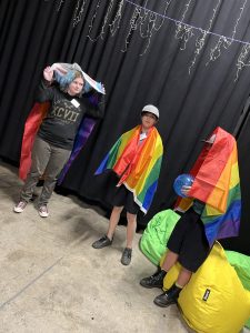 Three ranagathi draped in rainbow flags